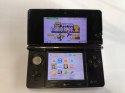 KONSOLA NINTENDO 3DS CZARNA + RYSIK + ŁADOWARKA + NEW SUPER MARIO BROS 2